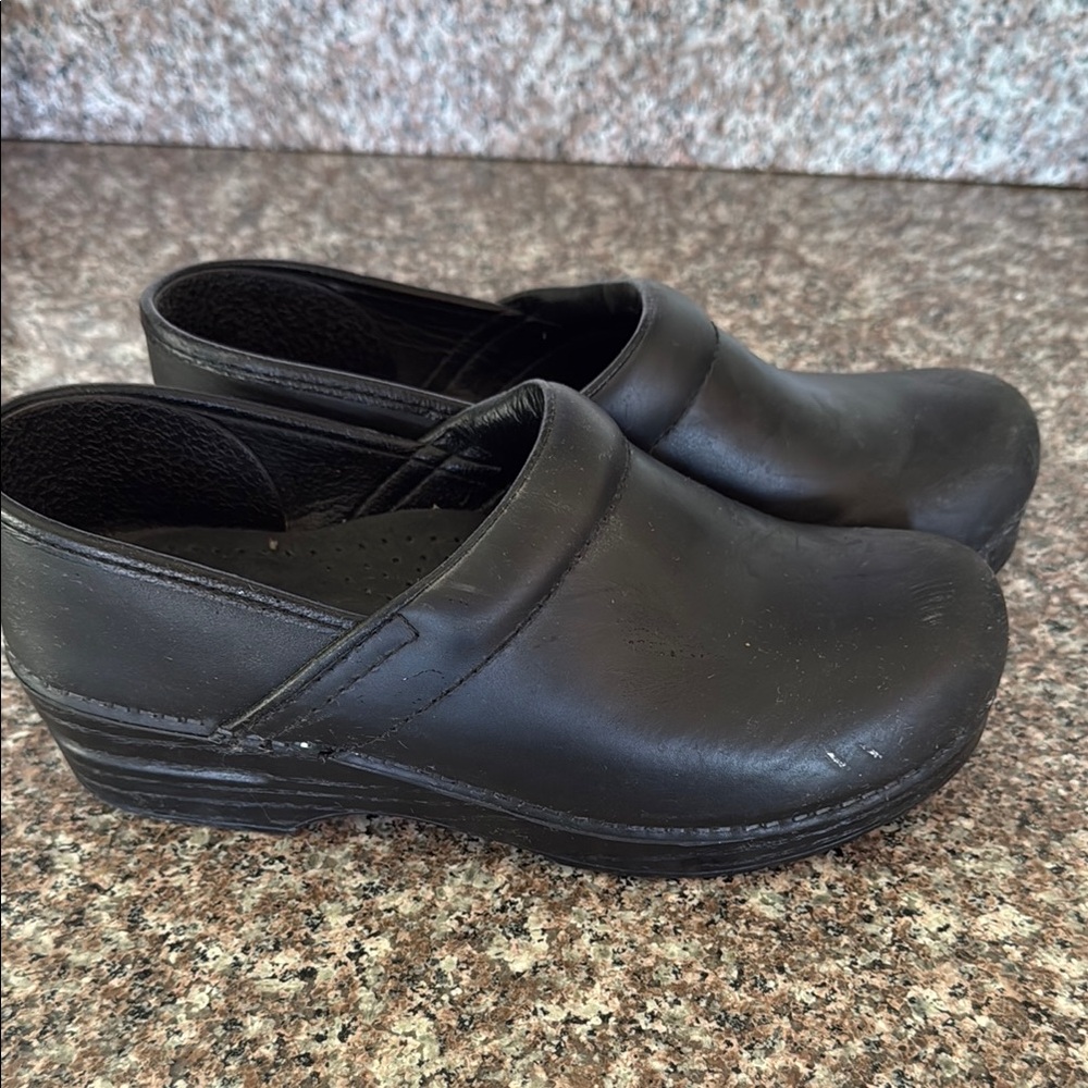 Dansko Black Leather Slip-On Loafers